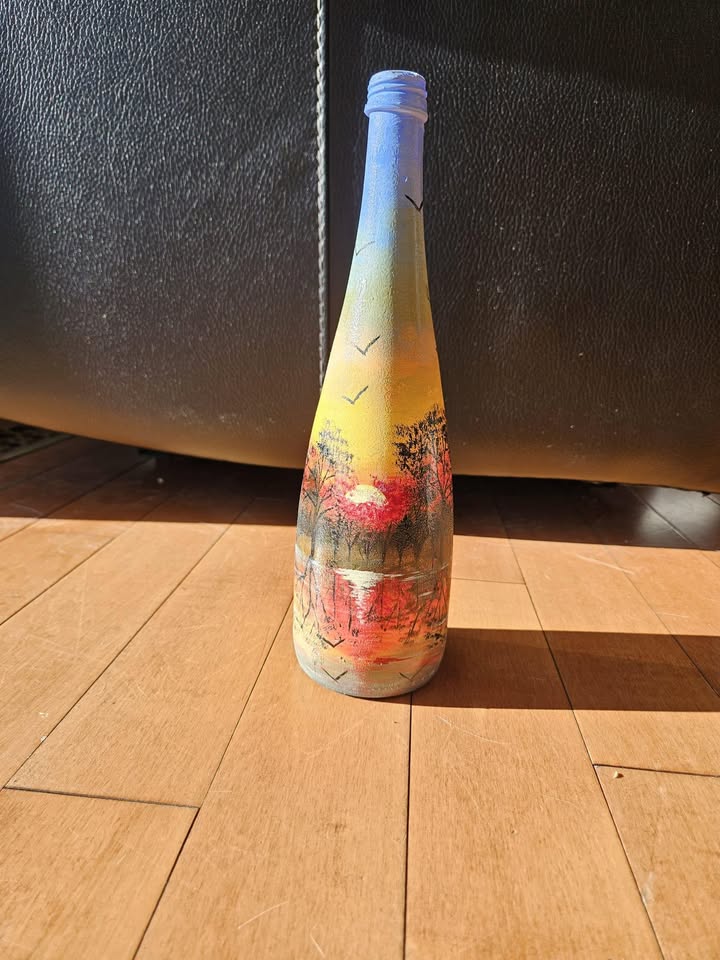 Decorated bottle artwork by Vidhi Shah