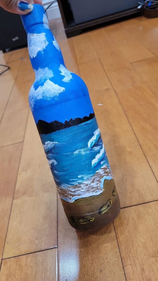 Decorated bottle artwork by Vidhi Shah