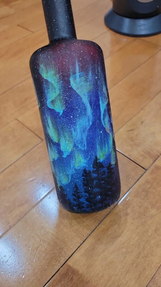 Decorated bottle artwork by Vidhi Shah