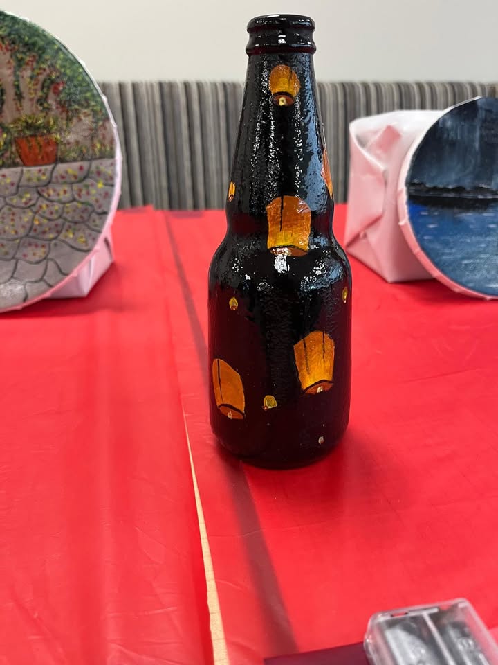 Decorated bottle artwork by Vidhi Shah