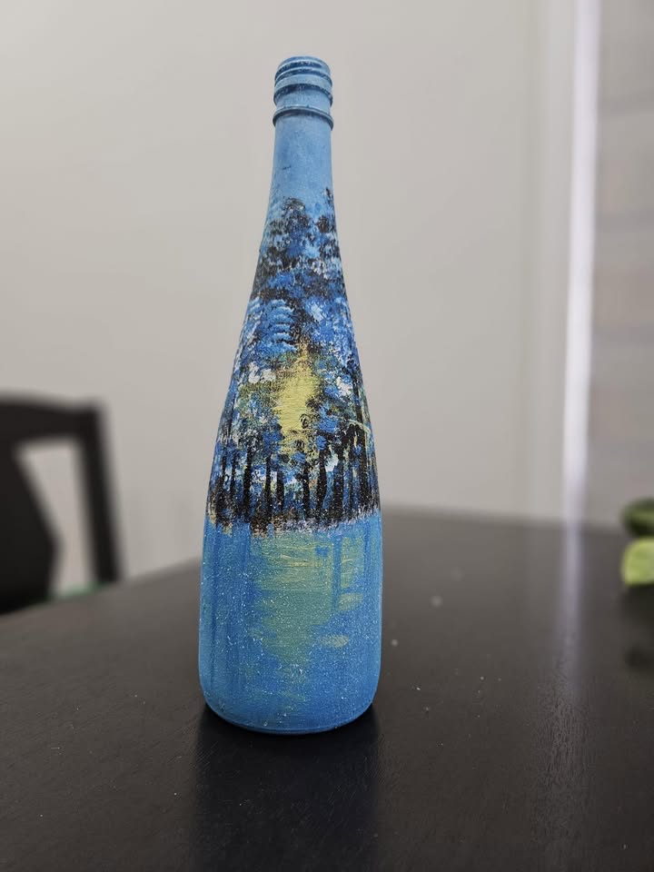 Decorated bottle artwork by Vidhi Shah