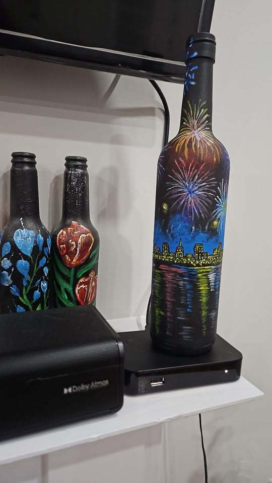 Decorated bottle artwork group by Vidhi Shah