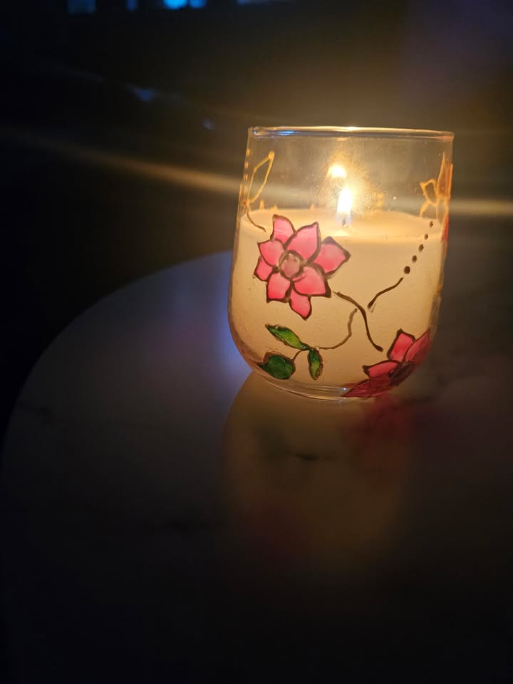 Hand decorated candle artwork by Vidhi Shah