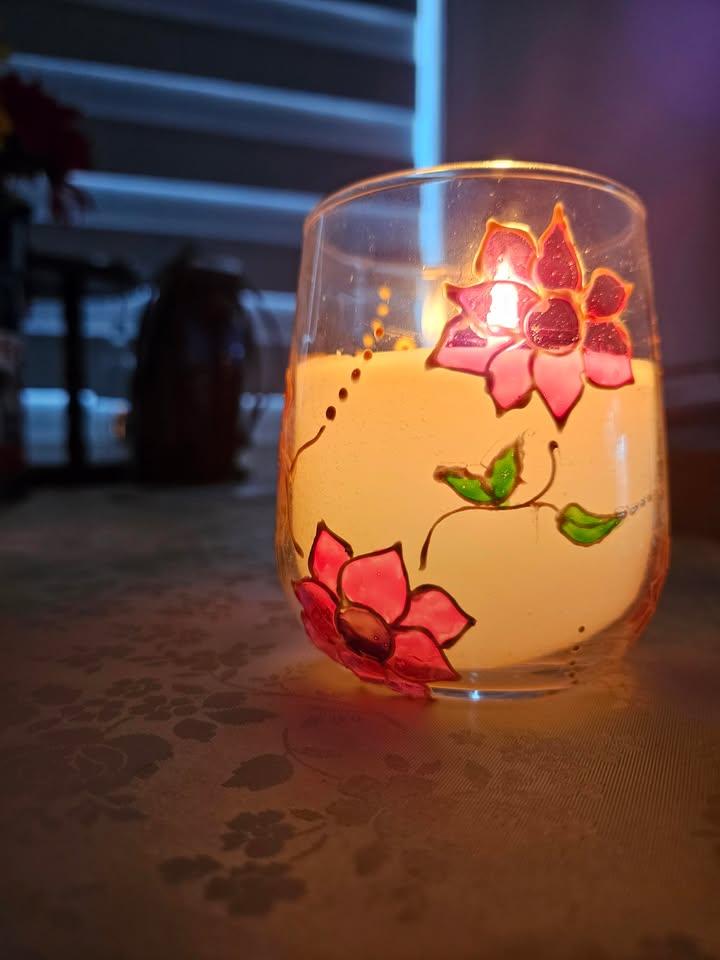 Hand decorated candle artwork by Vidhi Shah