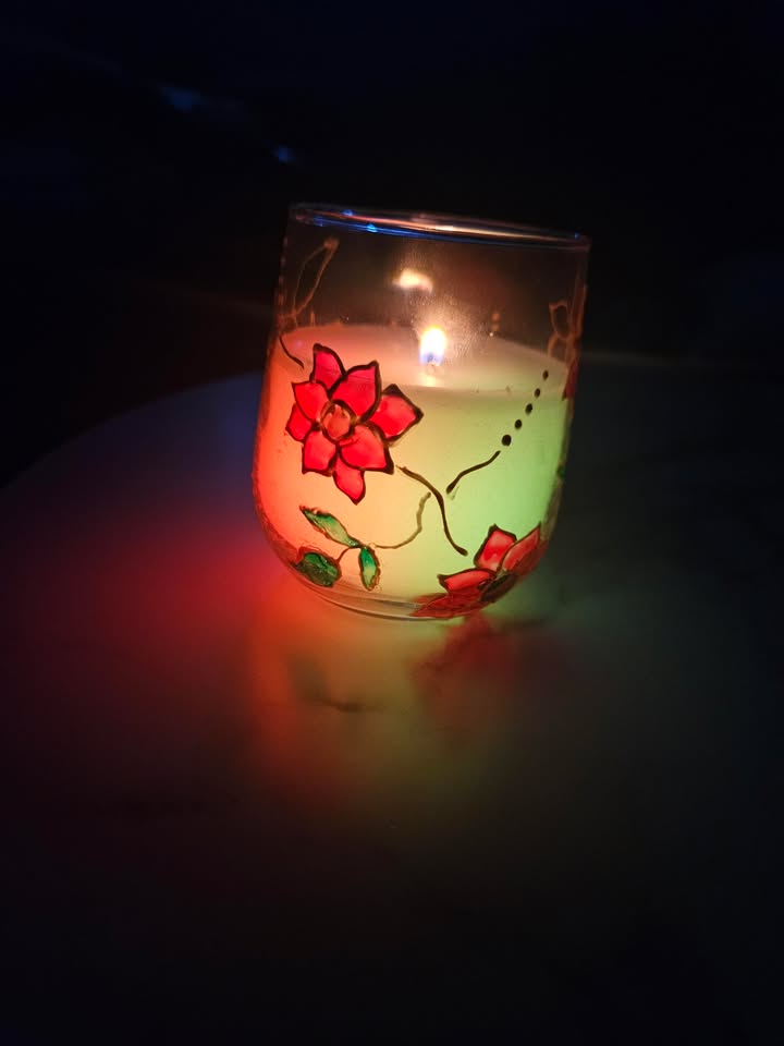 Hand decorated candle artwork by Vidhi Shah