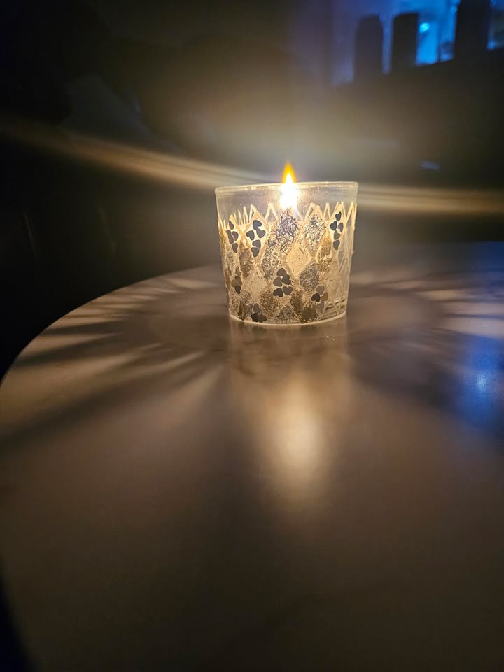 Hand decorated candle artwork by Vidhi Shah