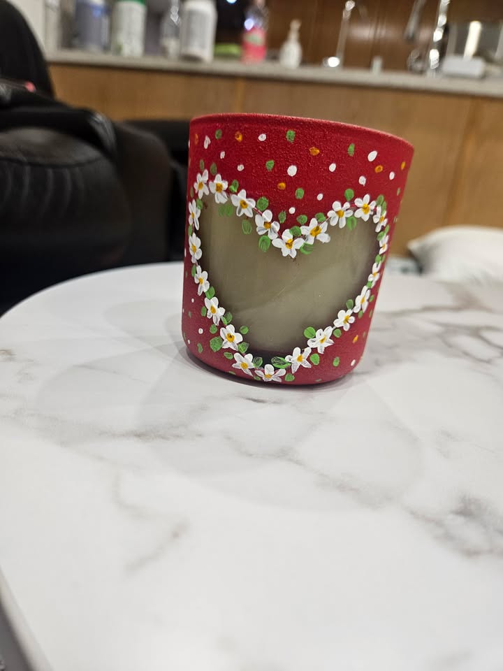Hand decorated candle artwork by Vidhi Shah